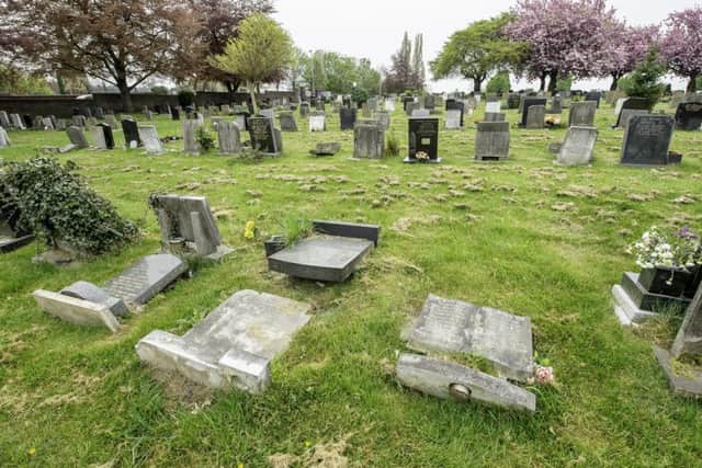 Gravestones are being laid flat by the council.